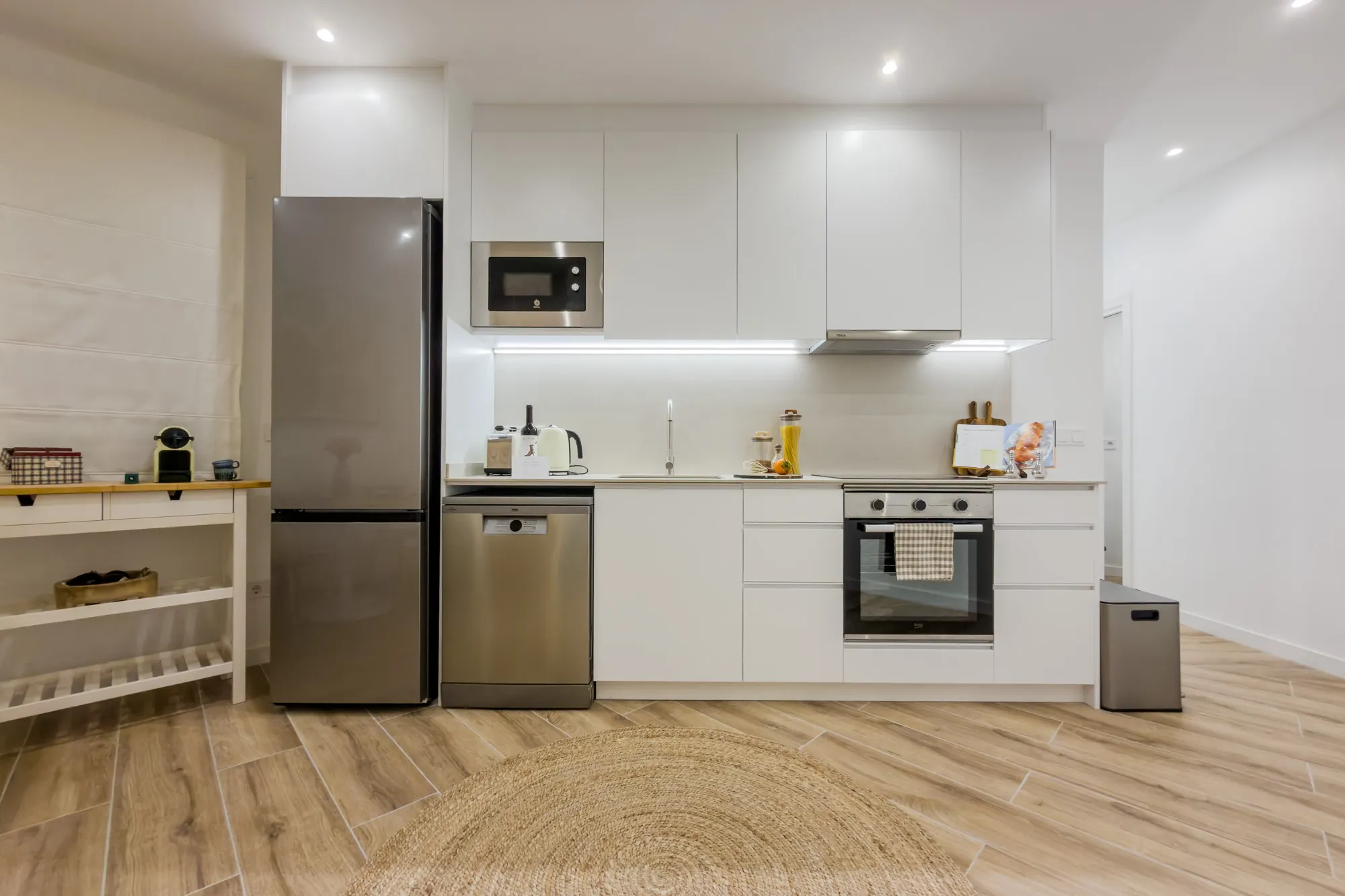 Kitchen of the Còrsega project, in Barcelona, after the interior design project