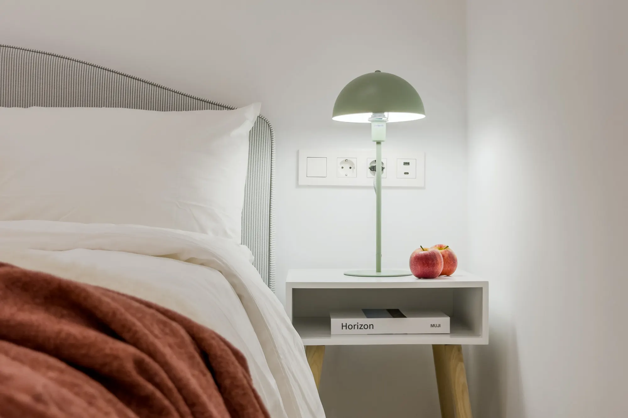 Bedroom, detail of the Còrsega project, in Barcelona, after the interior design project