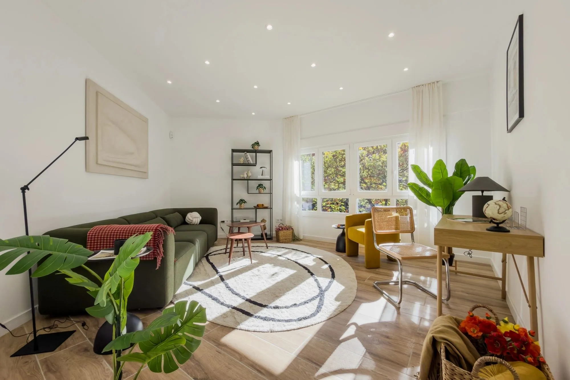 Living room of the Còrsega project, in Barcelona, after the interior design project