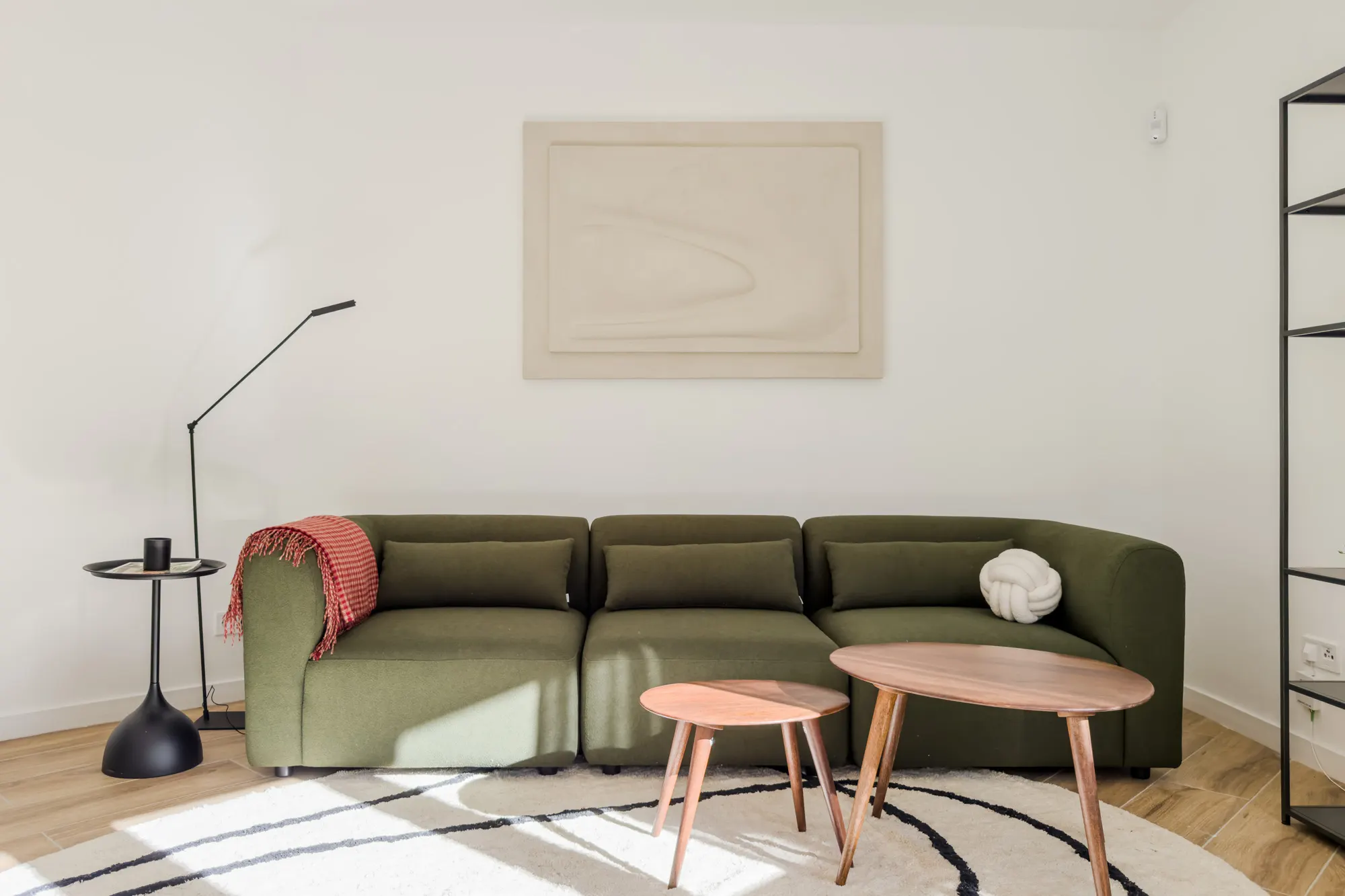 Living room of the Còrsega project, in Barcelona, after the interior design project