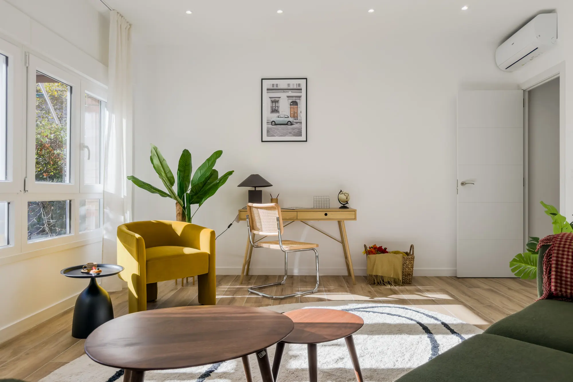 Living room of the Còrsega project, in Barcelona, after the interior design project