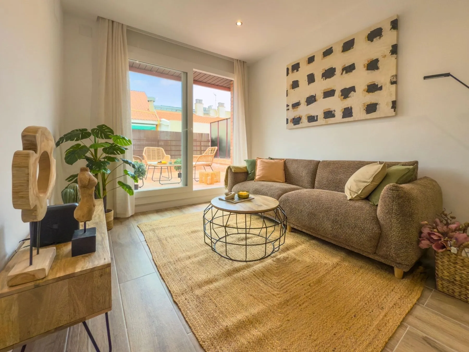 Living room of the Hipólito Lázaro project, in Barcelona, after the interior design project