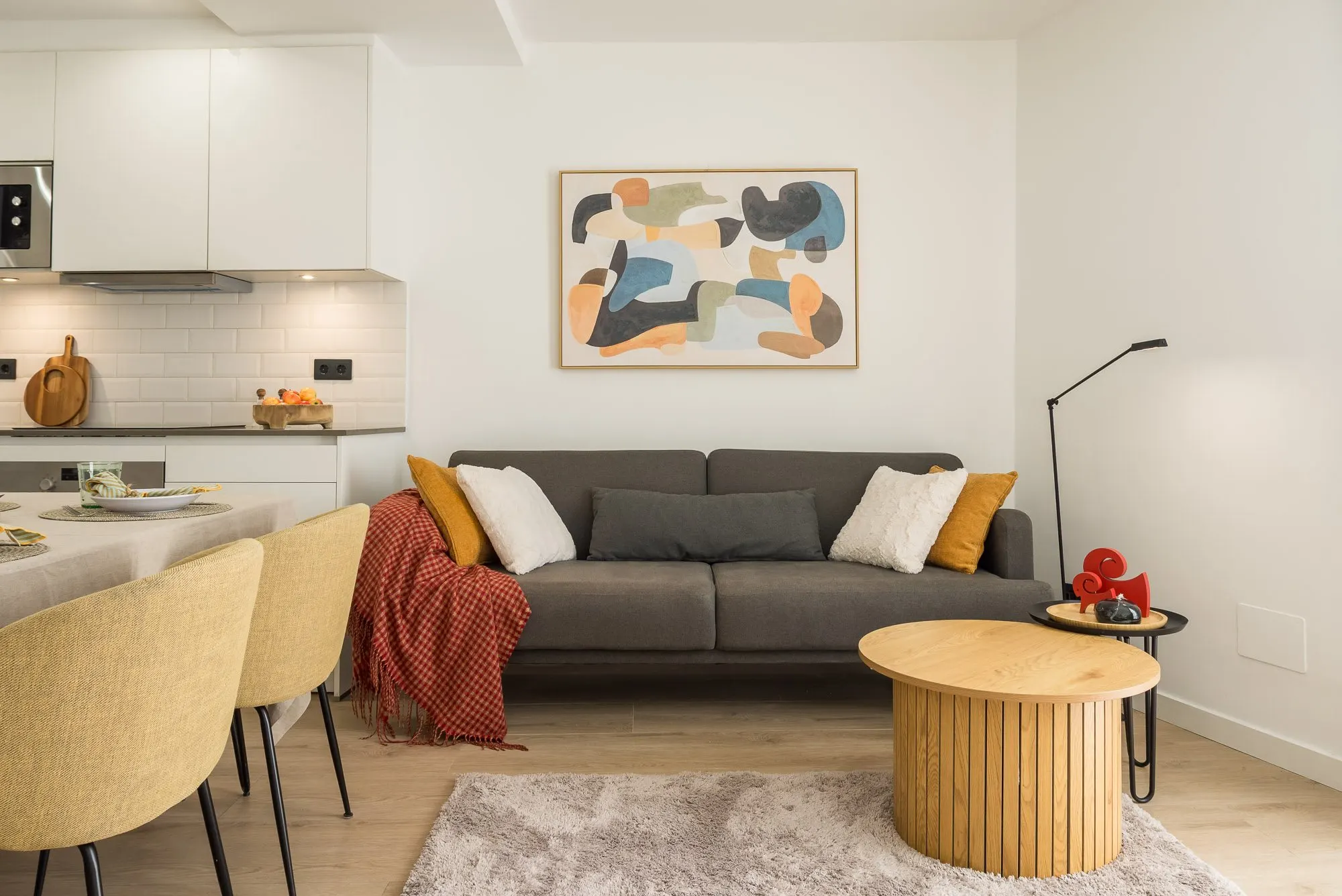 Living room of the Riera Baixa I project, in Barcelona, after home staging