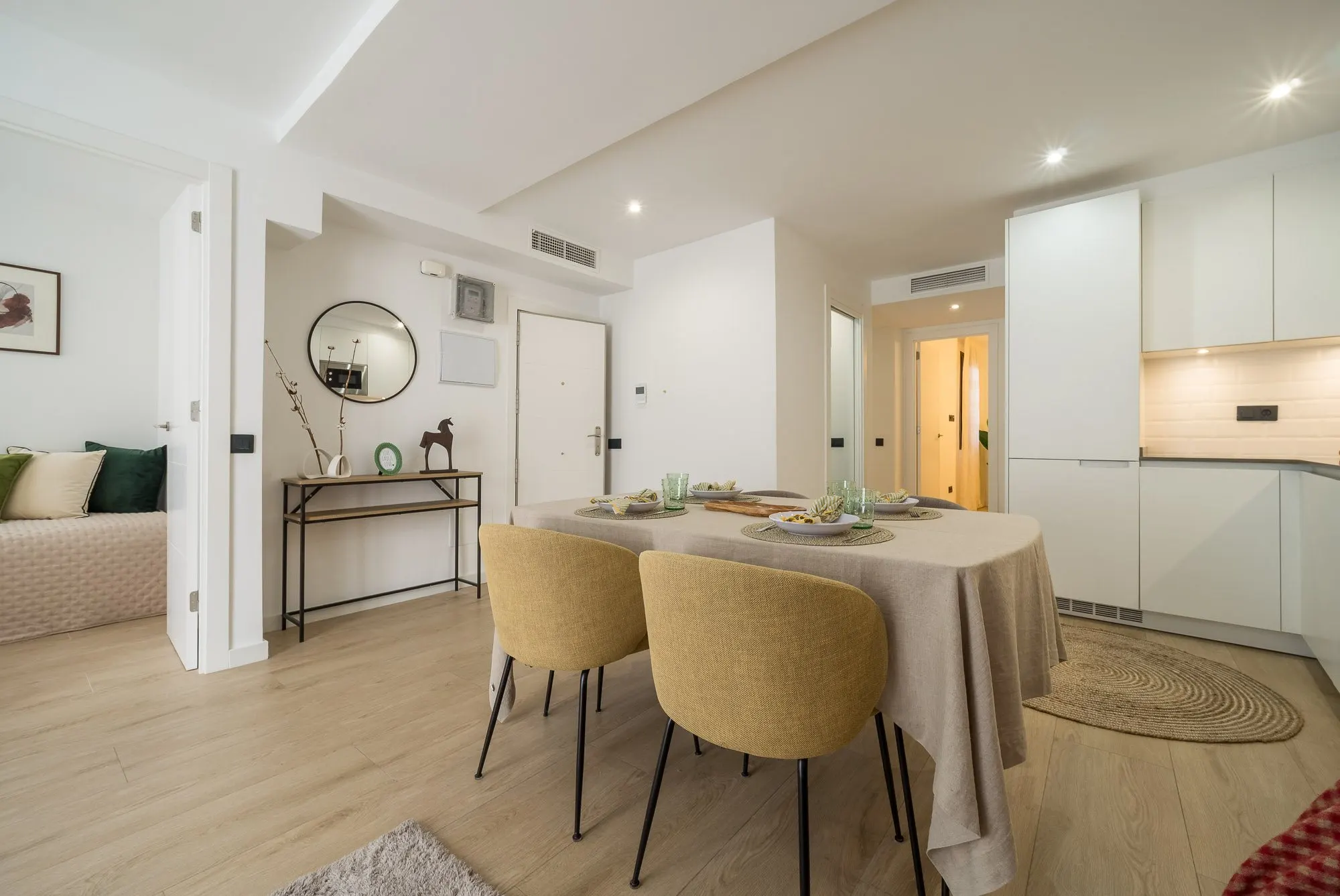 Living and dining room of the Riera Baixa I project, in Barcelona, after home staging