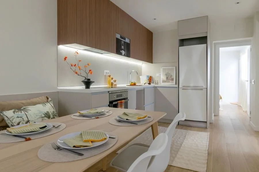 Kitchen and dining room of the Llobateras project, in Rubí, after home staging