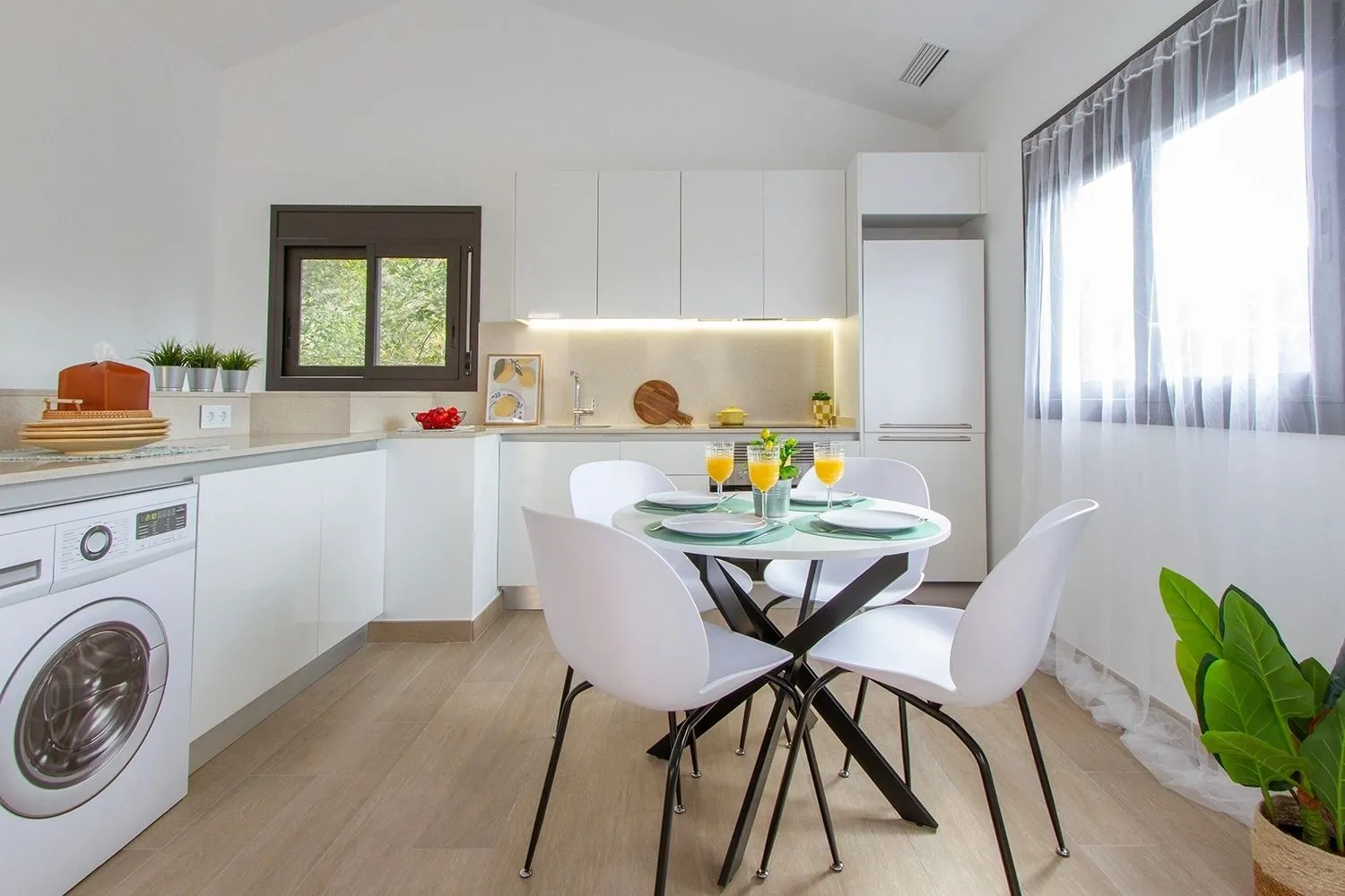 After: Kitchen and dining room of a flat in Valldoreix